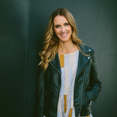 A woman smiling at the camera