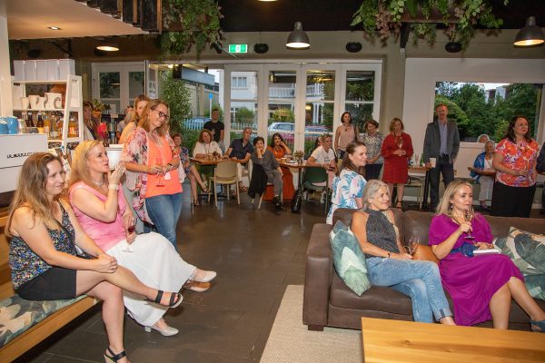 People listening to a speech