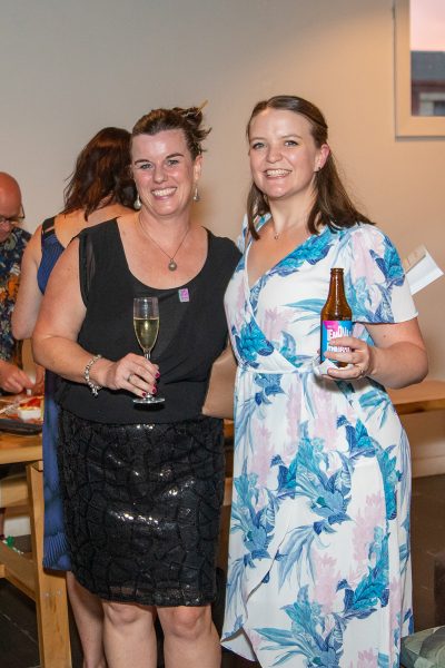 Two women smiling at the camera