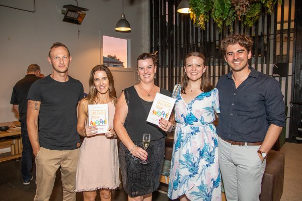 A group smiling at the camera