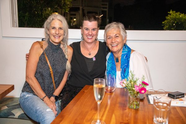 A group of women smiling at the camera